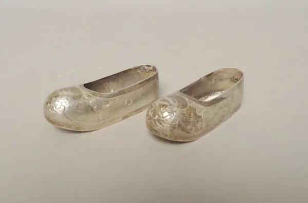 A pair of miniature Japanese white metal shoes bearing Japanese marks.  CAB