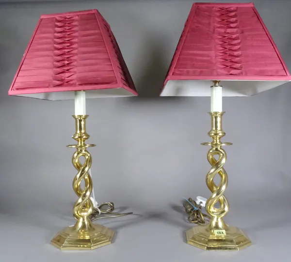 A pair of 20th century brass table lamps on twisted column and octagonal base, 63cm high, (2).   ROST