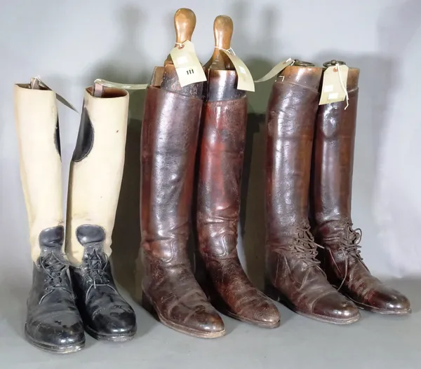 A pair of early 20th century gentleman's leather riding boots with wooden lasts detailed 'Maxwell Dover Street London', another similar pair with wood