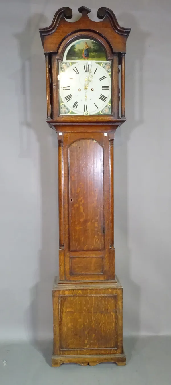A 19th century 8 day oak long cased clock, with broken arch pediment, painted arch top dial and a waisted case, (key, pendulum and two cast iron weigh