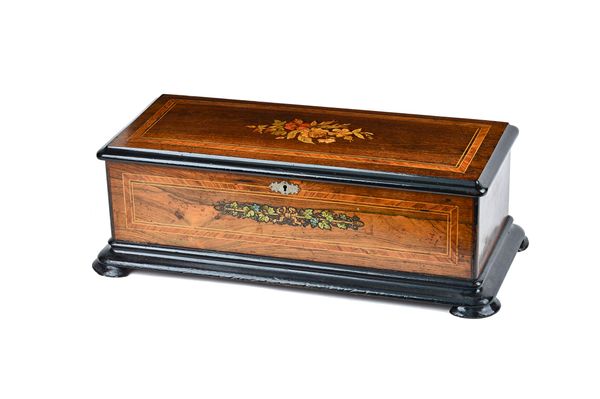 A walnut and marquetry inlaid Swiss cylinder music box, late 19th century, playing 10 airs with an 11 inch cylinder, stop/start and change/repeat, wit