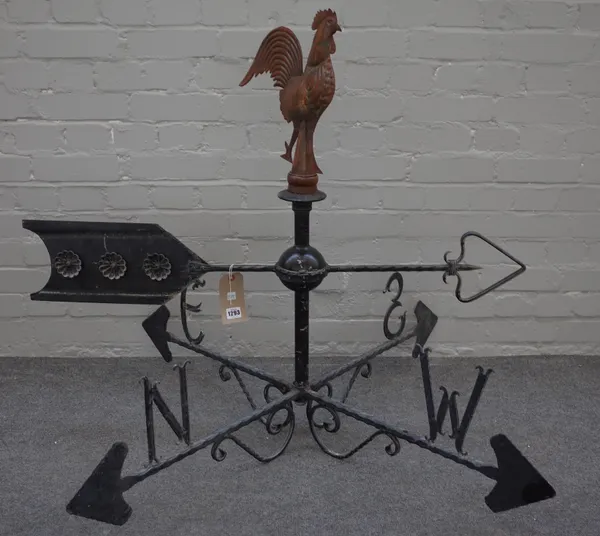 A late 20th century Continental wrought iron weather vane, with copper coloured cockerel finial and chamfered square rods, 92cm high.