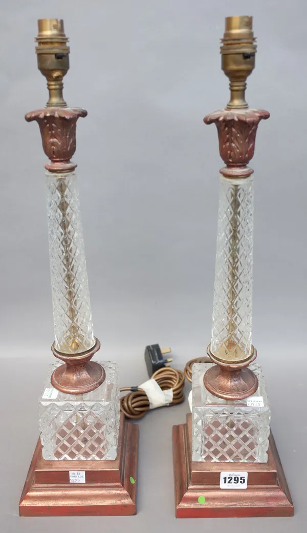 A pair of Victorian style glass and patinated metal table lamps, modern, of column form (45cm high) and a pair of modern gilt metal table lamps of cla