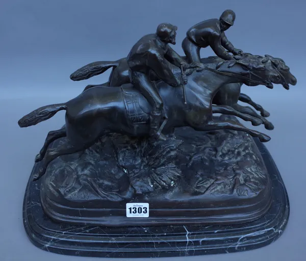 A modern equestrian bronze group, modelled and cast as two racing jockeys atop their mounts, indistinctly signed on a naturalistic base and black vein