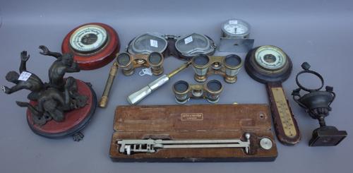 A quantity of collectables including a Regency style bronze pocket watch holder of urn form (17.5cm high), a bronze figural centre piece, enamelled op