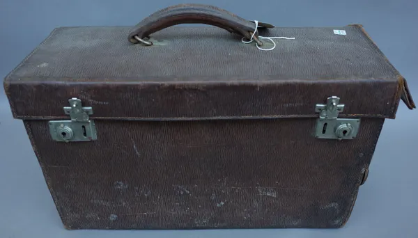 A midwife/ doctor's bag, mid-20th century, containing; forceps, sutures, tweezers and various other birthing related medical instruments, two further