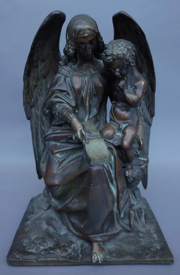 An early 20th century bronze figure group depicting The Archangel Gabriel with a putto on a naturalistic base, unsigned, 31cm high.