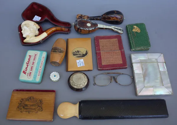 A quantity of small collectables, 19th century and later including; a cased Meerschaum figural pipe, a Mauchline ware string box, an abalone shell vis