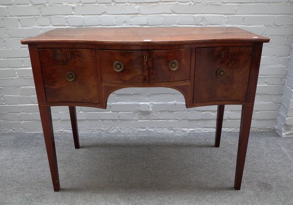 An early 19th century inlaid mahogany serpentine sideboard, with pair of frieze drawers and cupboard on tapering square supports, 118cm wide x 91cm hi