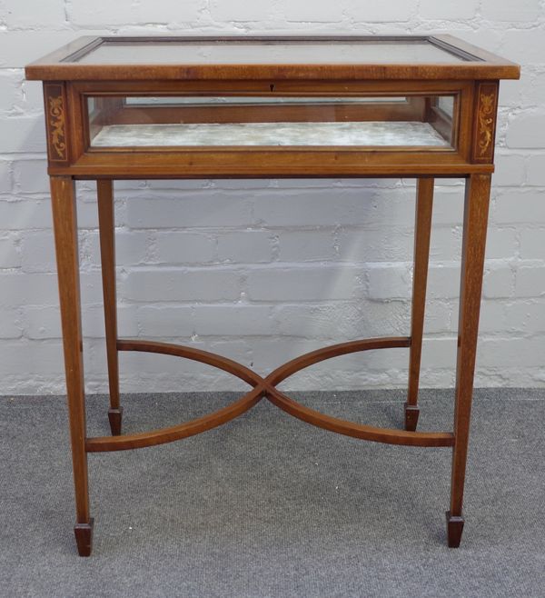 An Edwardian marquetry inlaid mahogany bijouterie table on tapering square supports, united by 'X' frame stretcher, 62cm wide x 74cm high x 43cm deep.