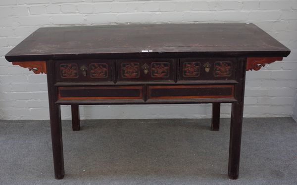 A late 19th century lacquered softwood three drawer side table on block supports, 149cm wide x 84cm high x 62cm deep.