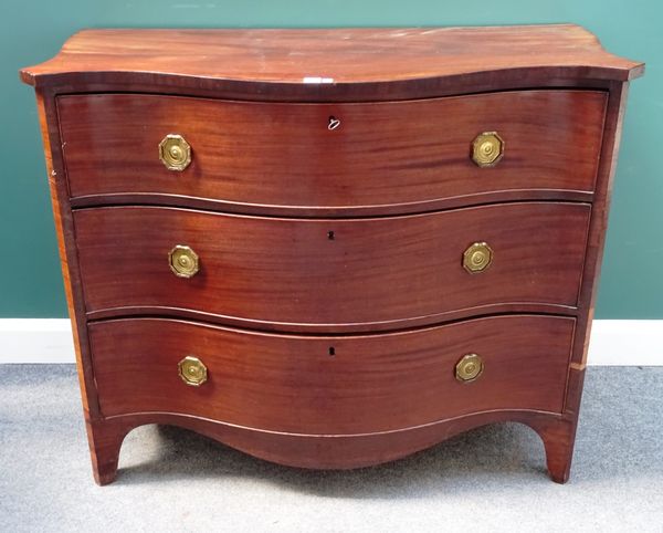 A George III serpentine fronted mahogany chest of three long graduated drawers, on bracket feet, 120cm wide x 100cm high x 60cm deep.