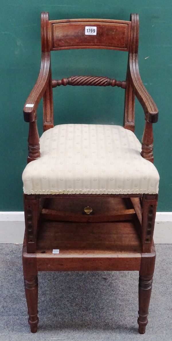 A Regency mahogany child's high chair, on square stand with turned supports, 39cm wide x 93cm high.