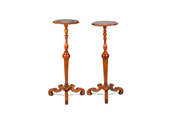 A pair of walnut and marquetry candle stands incorporating some late 17th/early 18th century elements, each with octagonal tops on turned and hexagona