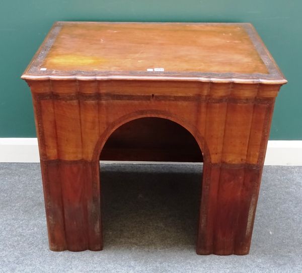 An early 20th century Anglo-Indian teak and satinwood writing desk, the lift top revealing an extensive pop-up fitted interior over arched kneehole re