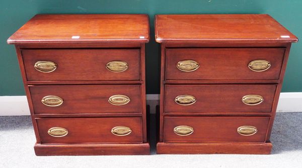 A pair of 18th century style mahogany three drawer chests on plinth bases, 65cm wide x 69cm high x 42cm deep (2).