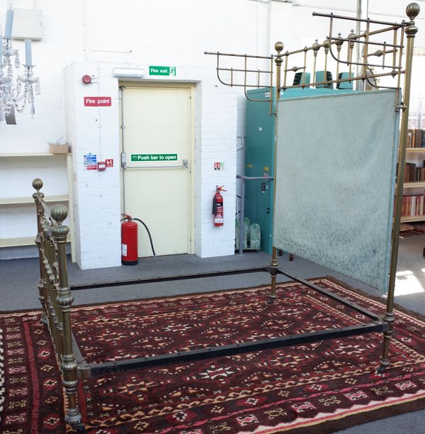 A late 19th century turned brass four poster bed with melon finials, 157cm wide x 230cm high x 200cm long.