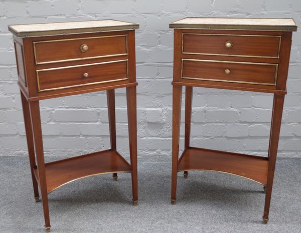 A pair of Louis XVI style gilt metal mounted marble topped two drawer bedside tables on tapering square supports, 41cm wide x 74cm high x 26cm deep.