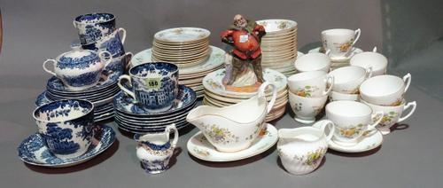 A Royal Worcester Pallisy pattern part dinner and tea service and a Royal Doulton figure, 'Falstaf'.  S1T