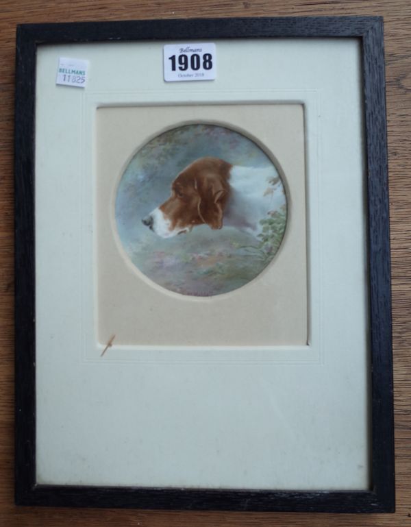 A  Doulton Burslem circular porcelain plaque, signed H. Mitchell,c.1900, depicting the head of a hound against a naturalistic ground, framed and glaze