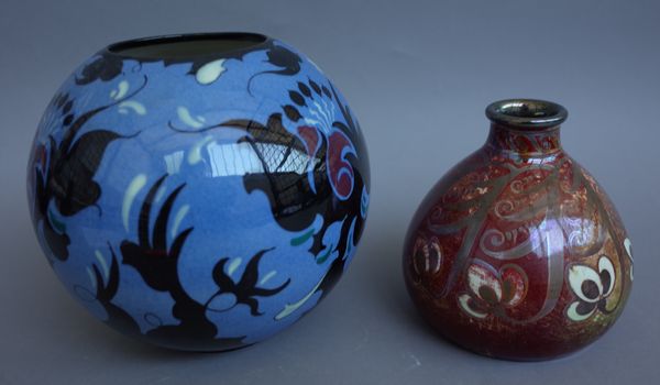 A Royal Lancastrian Arts & Crafts red lustre vase with gilt foliate decoration, painted and impressed marks, 12cm high and a Gouda Regina pattern vase