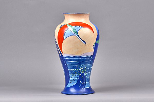 A John Butler Art Deco Wilkinson vase, 'Tahiti foam' pattern, signed 'J.Butler' to the baluster body, painted and printed marks, 36cm high. Illustrate