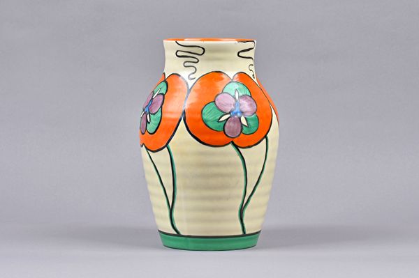 A Clarice Cliff 'Orchid' Latona form vase, Circa 1930, decorated with large orange flowers against a ribbed cream ground, black printed marks, 24.5cm