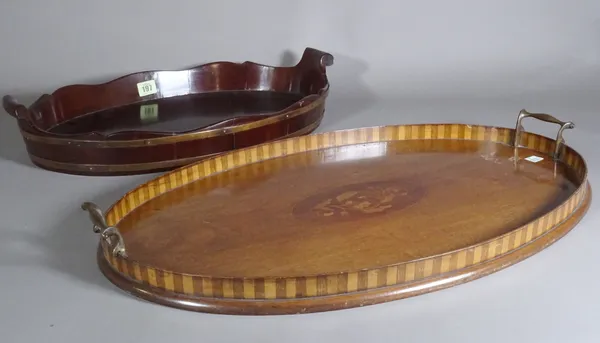 A 19th century oval mahogany twin handled tray, 56cm wide and another 50cm wide.  S2M
