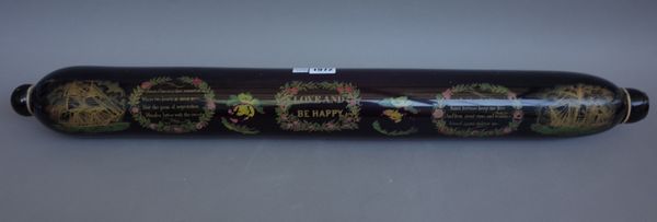 A Victorian purple glass rolling pin of large proportions, printed with 'LOVE AND BE HAPPY' and further moral verse flanked by 'BRIG & SCHOONER', 78cm