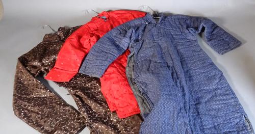 A Chinese red ground child's robe and two other Chinese robes, C.1930, (3).   S3T
