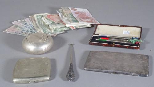 Silver plated wares; cigarette cases, three silver pens in a case, an ashtray, hook and foreign wares, (qty).   CAB