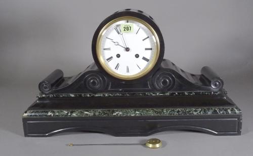 An early 20th century black slate cased mantle clock with 8 day movement, 46cm wide.   C10