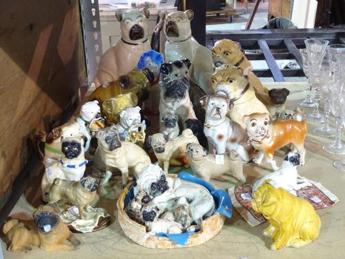 A quantity of Victorian and later ceramic models of pugs, (qty). On behalf of the Pug Dog Welfare & Rescue Association.  S2M