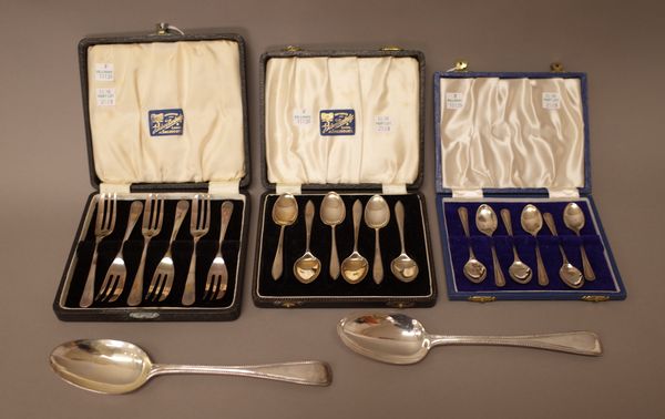 Silver flatware, comprising; a pair of Victorian double struck bead edged Old English pattern tablespoons, London 1865, a set of six cake forks, Sheff