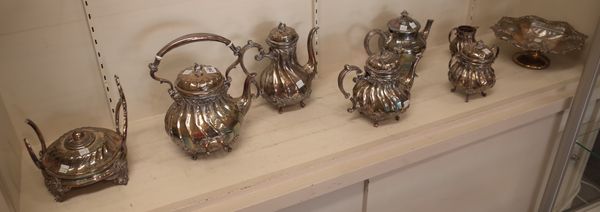 A group of late 19th century plated Britannia metal wares, comprising; a five piece tea and coffee set, consisting of a spirit kettle with a stand and