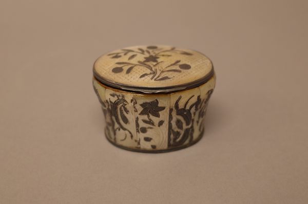 A silver mounted, mother of pearl, oval hinge lidded snuff box, of bombe form, probably North European, second half of the 18th century, having floral