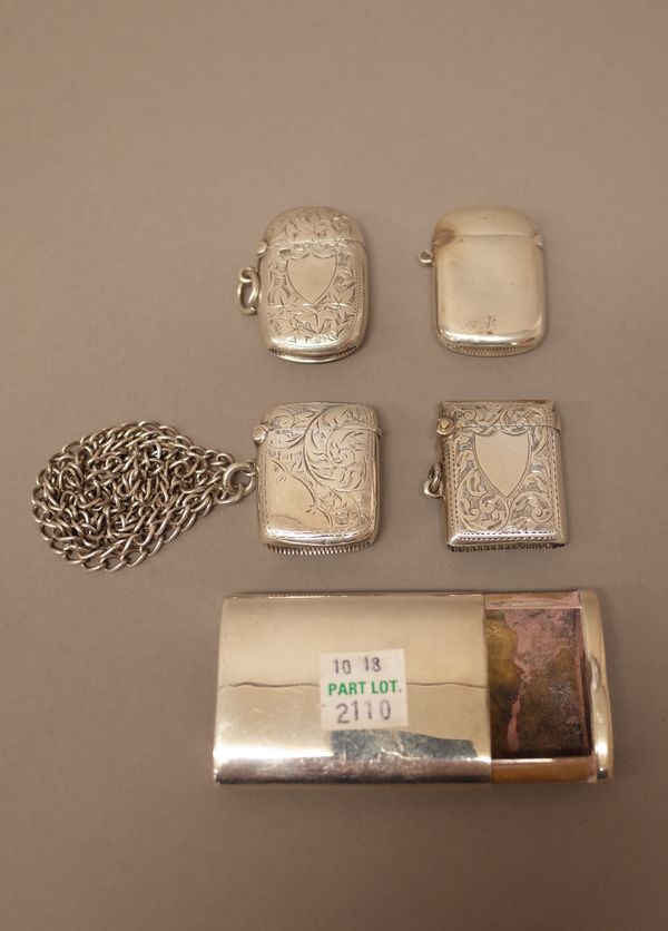 Silver, comprising; a rectangular vesta case, with scroll engraved decoration, Birmingham 1904, three further hinge lidded vesta cases, a slide action