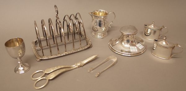 Silver and silver mounted wares, comprising; a small milk jug, London 1932 and a circular capstan shaped inkstand, Birmingham 1907 and plated wares, c