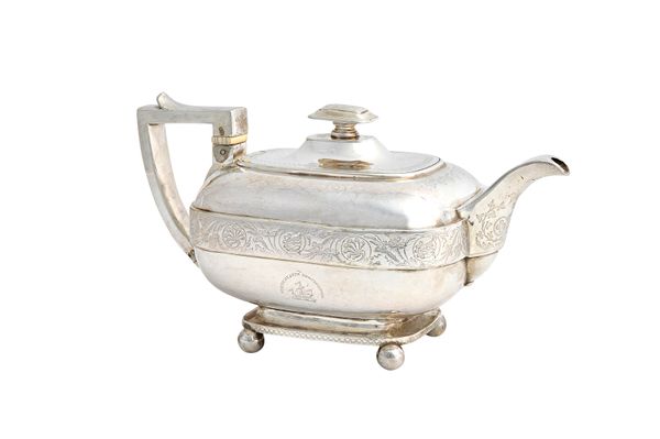 A George III silver three piece tea set, comprising; a teapot, a twin handled sugar bowl and a milk jug, each piece of curved rectangular form, decora