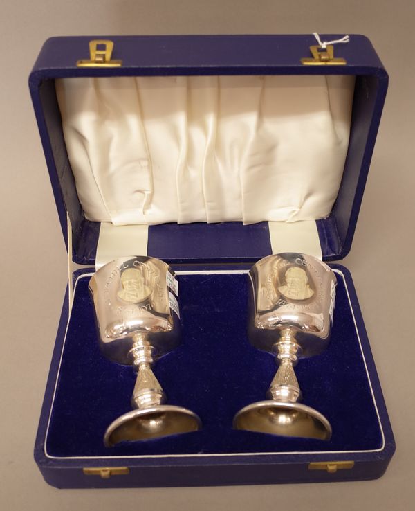 A pair of silver goblets, commemorating The Churchill Centenary, 1874-1974, Birmingham 1973, combined weight 313 gms, with a fitted case.