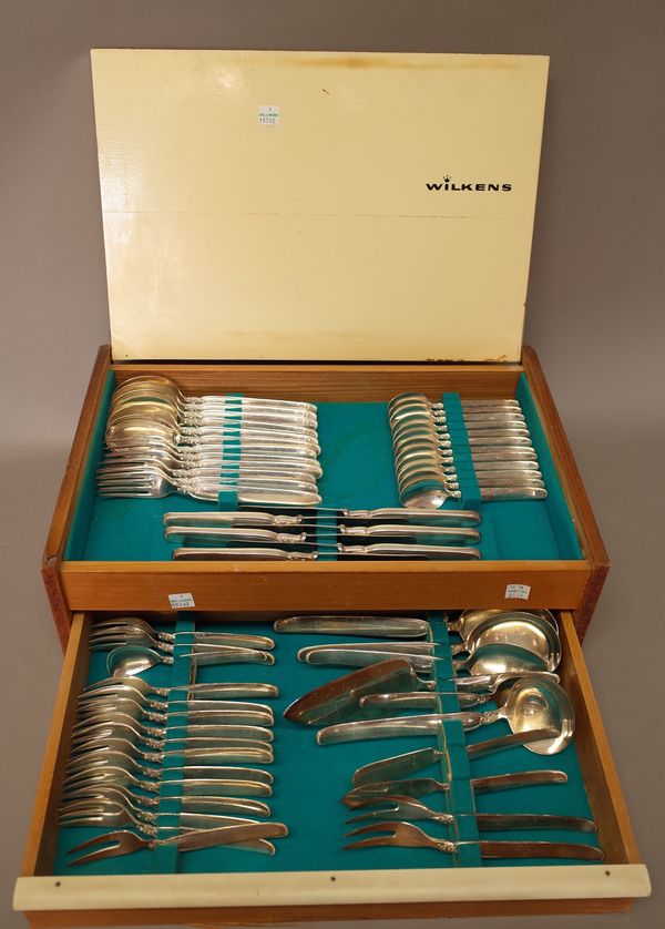 A German plated part table service, comprising; six dessert spoons, six dessert forks, twelve teaspoons, six steel bladed knives, thirteen small forks