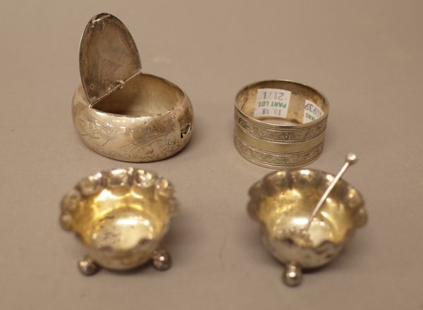 An Asian oval hinge lidded box, decorated with boats, a bridge and a forested mountain scene, a pair of Victorian silver salts and one salt spoon, Lon