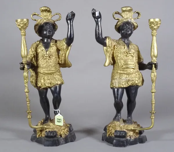 A pair of gilt metal and patinated Nubian figures. 39cm tall.  CAB
