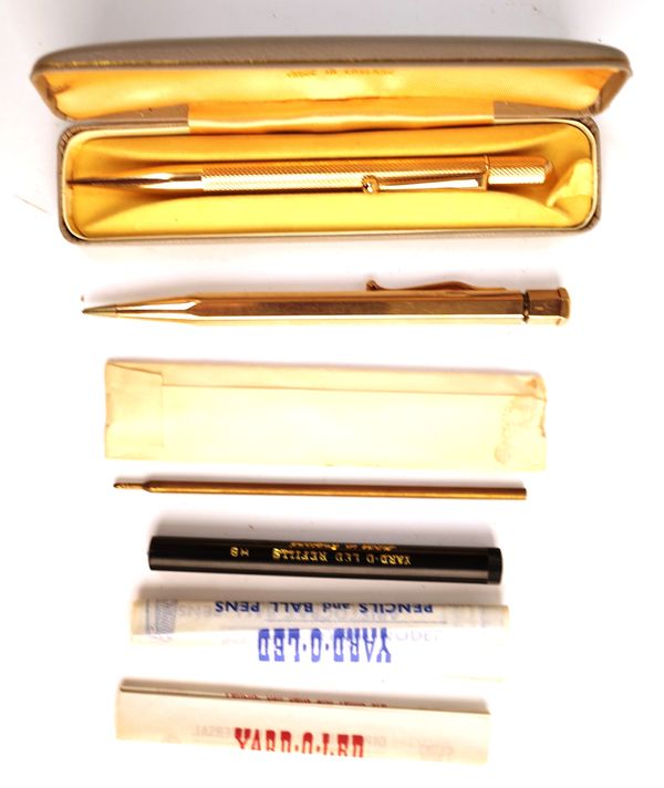 A 9ct gold cased propelling pencil with engine turned decoration, detailed 1909 W 1959, a YARD.O.LED case, paperwork and refills, a YARD.O.LED 9ct gol