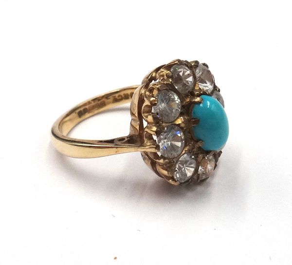 A 9ct gold, turquoise and colourless zircon set oval cluster ring., mounted with the oval turquoise to the centre within a colourless zircon surround,