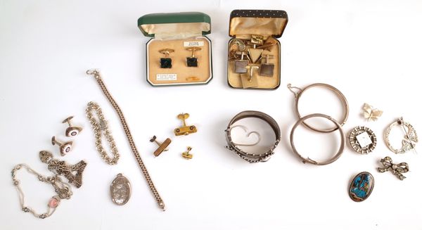 Mostly silver jewellery, comprising; a Victorian oval hinged bangle, in a buckle and strap design, two further bangles, two pairs of cufflinks, a plai