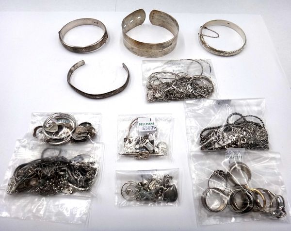 Mostly silver jewellery, comprising; eighteen necklaces and chains, two pendant necklaces, four bangles, a brooch, twelve rings, four pairs of earring