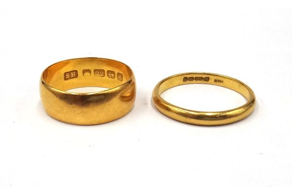 A 22ct gold plain wedding ring, Birmingham 1906, ring size L and a half and a 22ct gold plain wedding ring, Birmingham 1956, ring size Q, combined wei