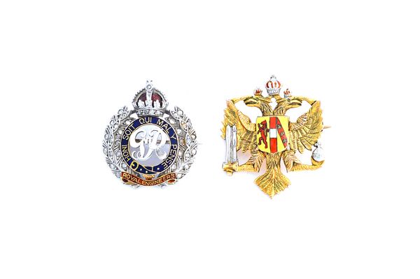 A diamond set and enamelled military brooch badge, designed as the badge of The Royal Engineers, George VI design and a 9ct gold and enamelled brooch