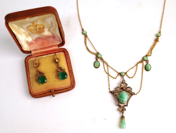 A Sterling silver gilt, colourless and pale green cabochon paste imitating jade pendant necklace, in an openwork design, detailed Sterling and a pair